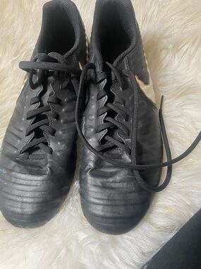 Nike Men’s Black Athletic Soccer Shoes with Gold Swoosh